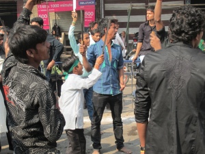 Boy Leading Group in Chant